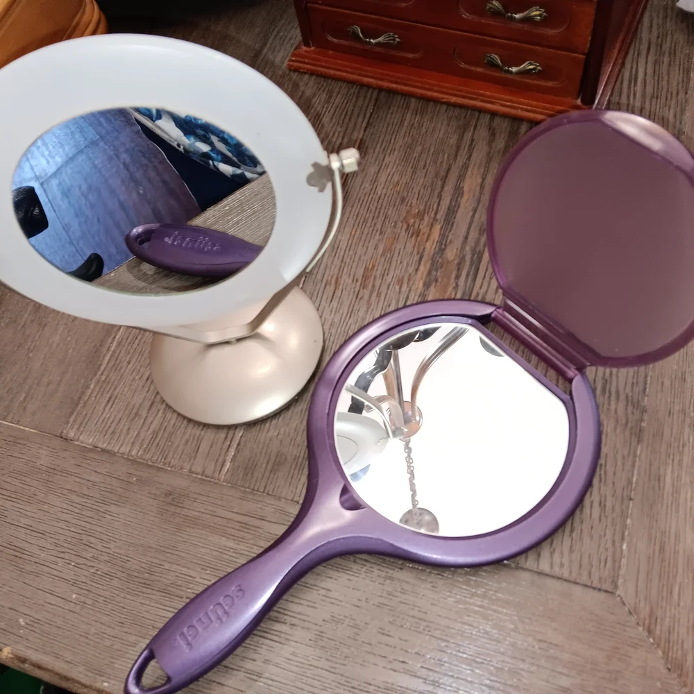 Purple Handheld Mirror And Standing Silver Mirror